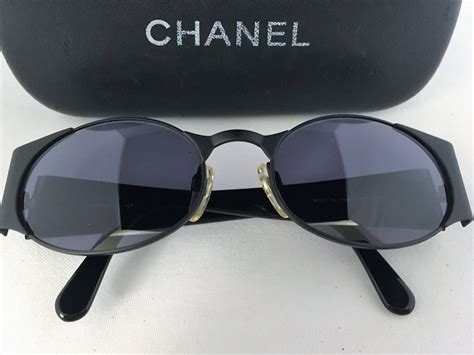 black retro chanel sunglasses|authentic Chanel sunglasses.